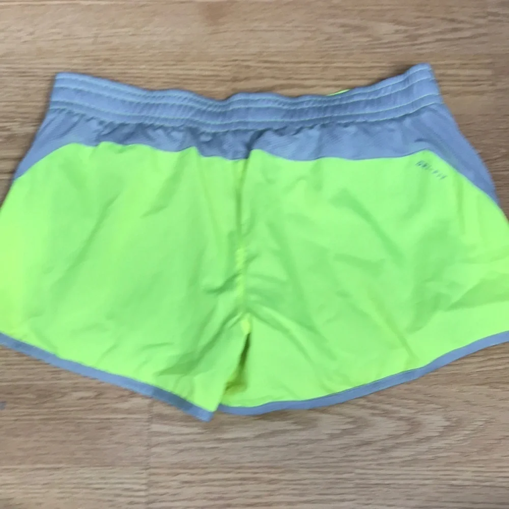 Nike neon yellow running shorts size medium NEW
